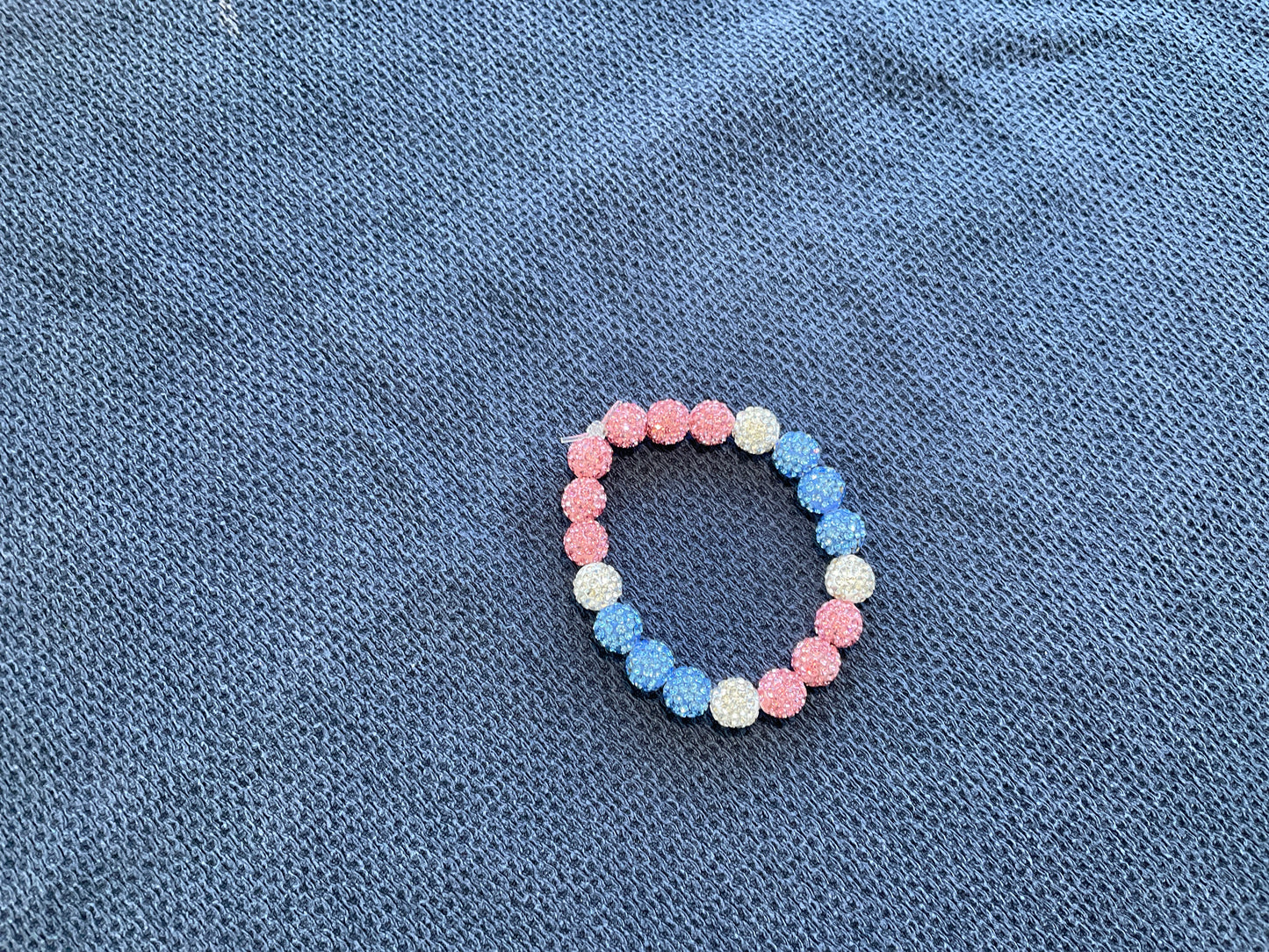 Pink blue and white bracelet youth